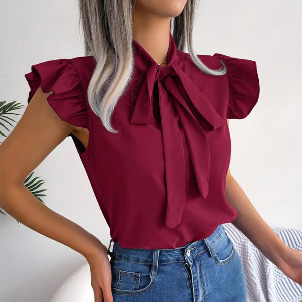 Clossy | Elegante Bluse mit Rüschen und Schleife